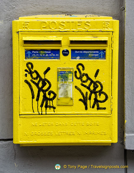 A grafittied postbox 