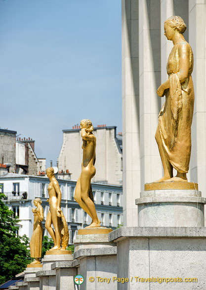 Four of the eight gilded statues on the Rights of Man terrace
