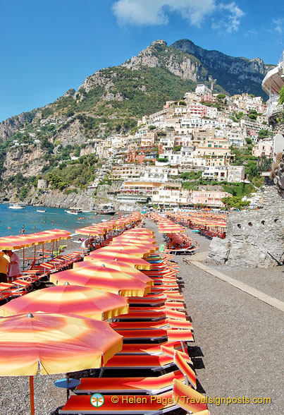 Rows of bright umbrellas on the Spiaggia Grande or the big beach in Positano