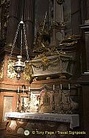 The left side altar in the transept contains the skeleton of St. Coloman in a sarcophagus
