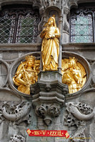 Gilded statue and medallions on the Holy Blood Basilica