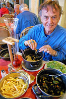Tony enjoying moules frites at the Restaurant Central