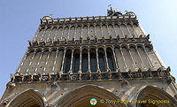 Two rows of pencil-thin columns on facade of Dijon Notre Dame