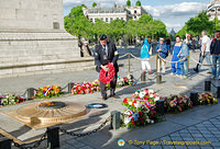 A ceremony at the Memorial Flame of the Arc de Triomphe