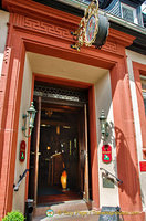 Red doorway to the Doctor Weinstube
