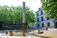 A fountain with sculptures around it near Willy Brandt Platz