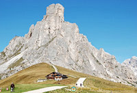 Hotel Passo Giau set against a mountain backdrop
