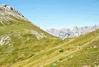 A walker on the Dolomites trail