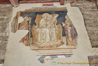 The Maestà, one of the frescos in Loggia del Giudice