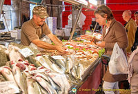 An early shopper at the fish market