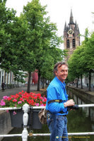 Tony with the Oude Kerk clock tower in the background