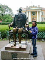 Touching the hand of Peter the Great to receive good wishes