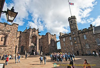 The Royal Palace in Crown Square, with the flag flying, was the home of Scotland's kings and queens when they were in Edinburgh