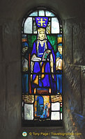 Stained glass window depicting Malcolm III's queen to whom the chapel is dedicated