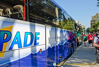 Lines of tour buses at the west facade