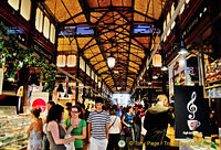 You'll find people, tapas and a nice atmostphere at the Mercado San Miguel