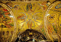 Mosaics showing the Black Madonna being proclaimed patron saint of Catalonia and other religion scenes.