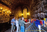 Path of the Ave Maria where pilgrims offer candles on their way out from seeing the Black Madonna