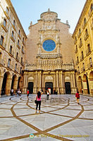 The facade of Montserrat Basilica and the inner courtyard