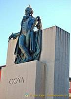 The Goya Monument:  Goya is poised to paint the scene below him