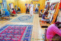 Workroom where village women handweave silk rugs
