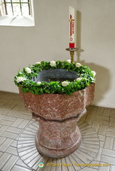 Holy water stoup in Weissenkirchen white church