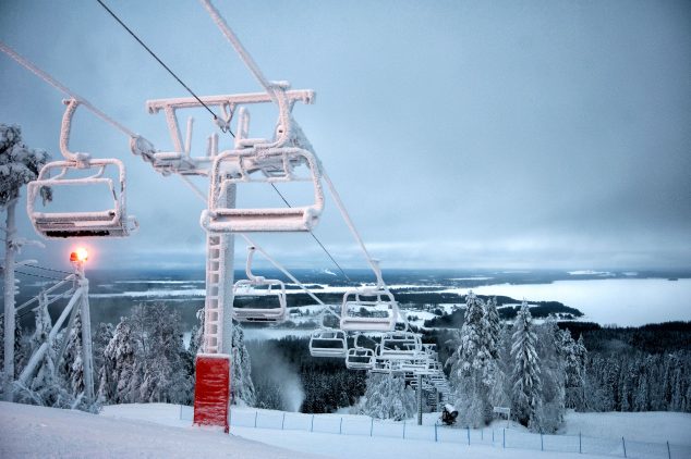 Icy ski lift and snowy slopes...
