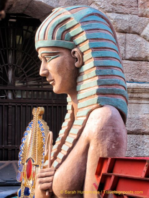 Items of scenery lie about outside the Arena between performances.