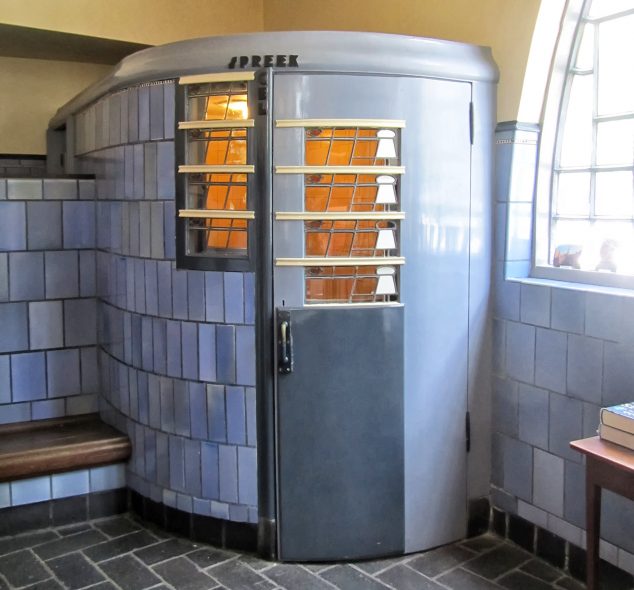  Telephone booth in the former post office in apartment building and museum Het Schip in Amsterdam