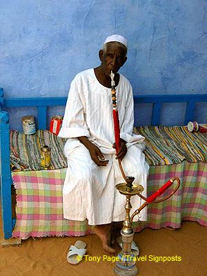 Smoking his water-pipe.

[Aswan - Egypt]