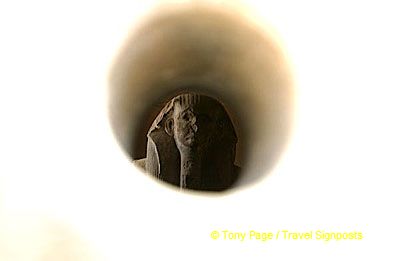 Statue of King Djoser viewed through a peephole.
[Step Pyramid of Djoser - Saqqara - Egypt]