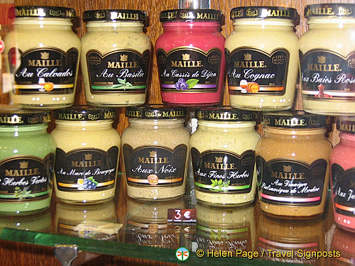 Colourful jars of Dijon Mustard