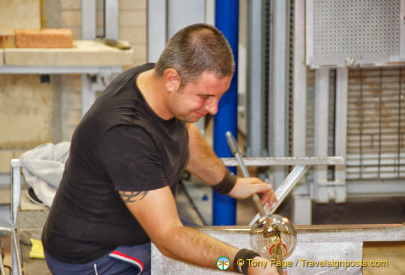 With great skill of the glassmaker, the hot glass begins to take shape