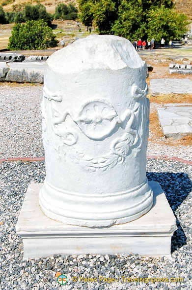 This column with two serpents is a symbol of medicine. Snakes renew their bodies by shedding skin and hence the belief that snakes have healing power.