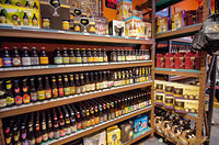 Neat stacked shelves of Belgian beers