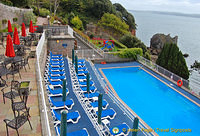 This swimming pool enjoys harbour views