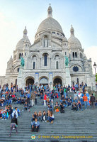 The Sacré-Coeur exterior is built from travertine stone. It gives out calcite on contact with rain, making it white