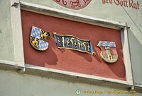 Bavarian and town crest on gable of Deggendorf Old Town Hall