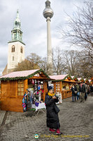 TV Tower and the spire of Marienkirche towering over the Christmas market