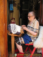 Look into doorways and you never know what you may see.  This lady was doing her crochet