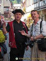 Willy Herth, Miltenberg's singing guide, trying to snare Tony for a tour. 