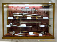 Showcase of guns and swords