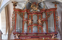 Richly carved facade of the organ