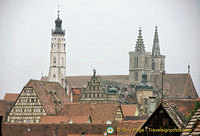 View of St Jakobskirche twin spires and the white town hall tower