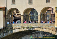 The shops on Ponte Vecchio sell jewelry, artwork and souvenirs