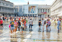 Tourists wading in Piazza San Marco