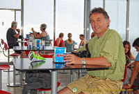 Enjoying a cup of coffee on top the The Rock