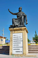Statue of Hacı Bektaş Veli with some of his teachings on the column