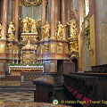 ABSIT GLORIARI NISI INCRUCE, the leitmotif found in the inscription over the Benedict Hall