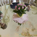 This mirror table reflects the artwork of the ceiling